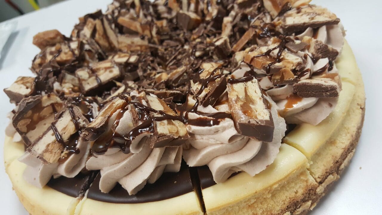 a picture of a Snickers Cheesecake
