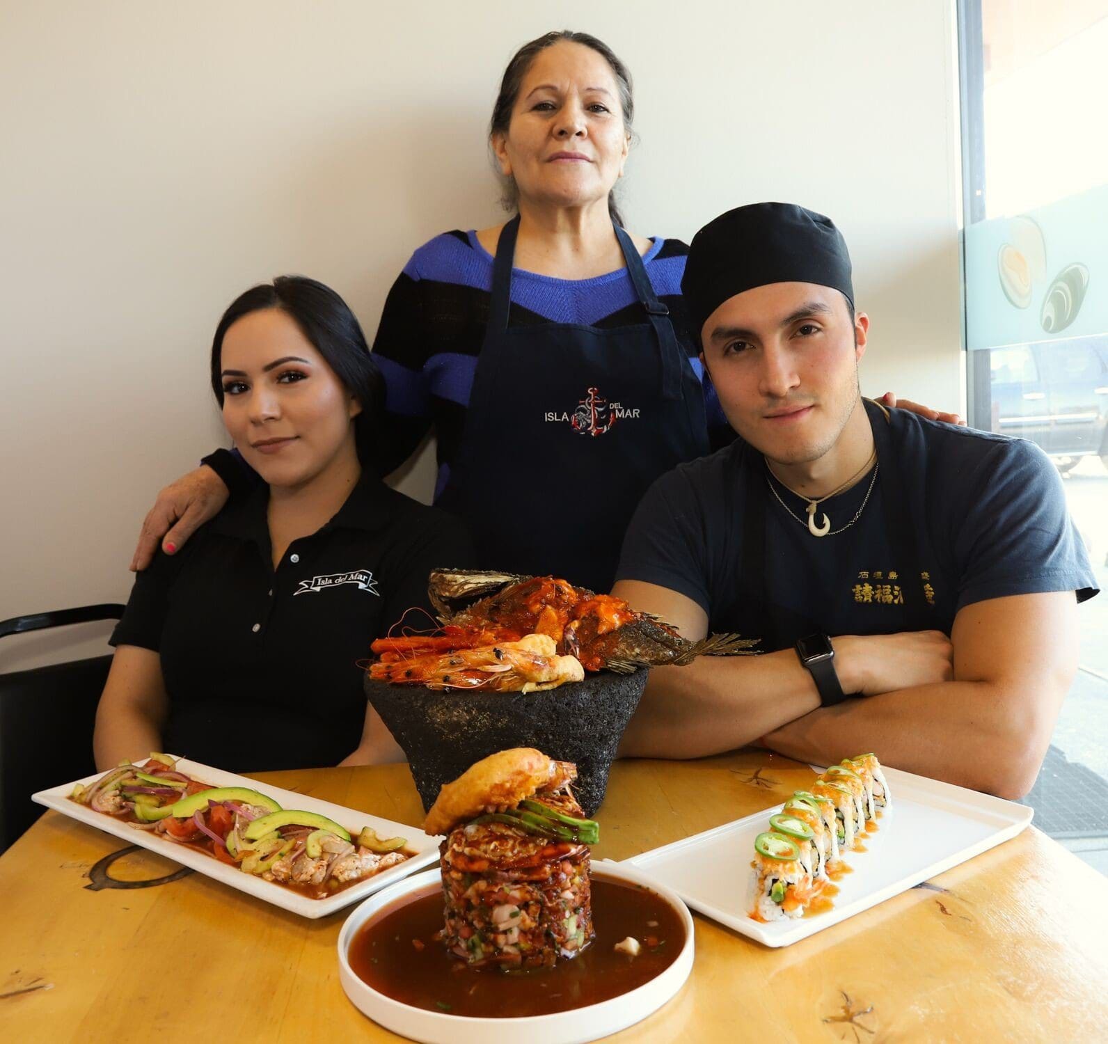 Iliana Gonzalez, Dolores Hernandez, & Julio Cajas help manage Isla Del Mar Restaurante for Ismara Gonzalez.